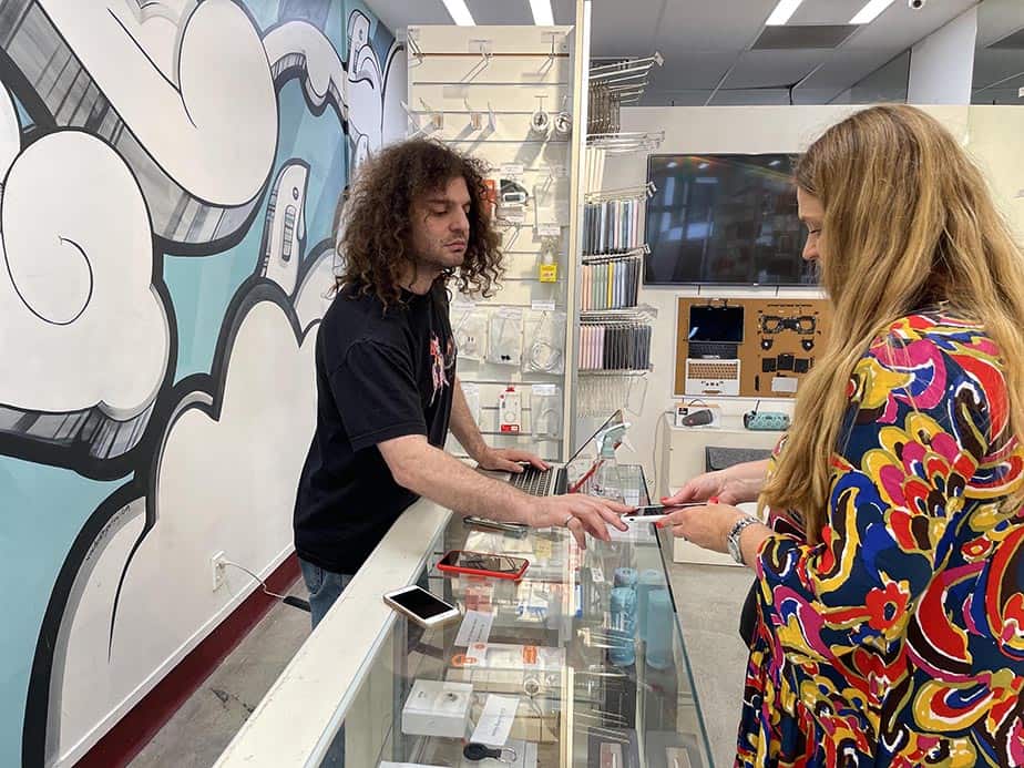 Device Repair Guy serving customers in store