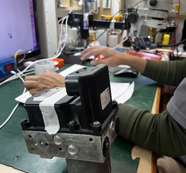 ABS module being assessed at Device Repair Guy